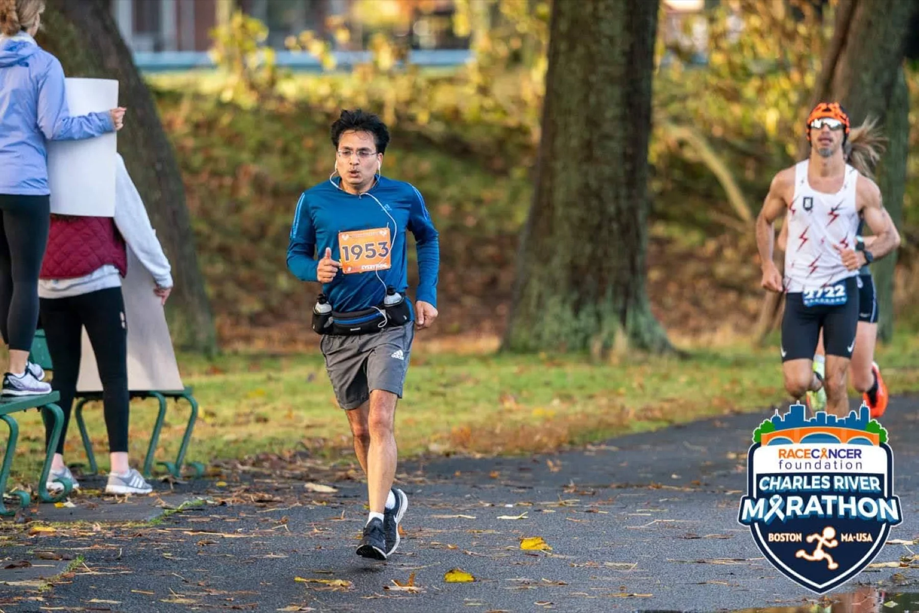 Ajay running the Charles River Marathon in 2021